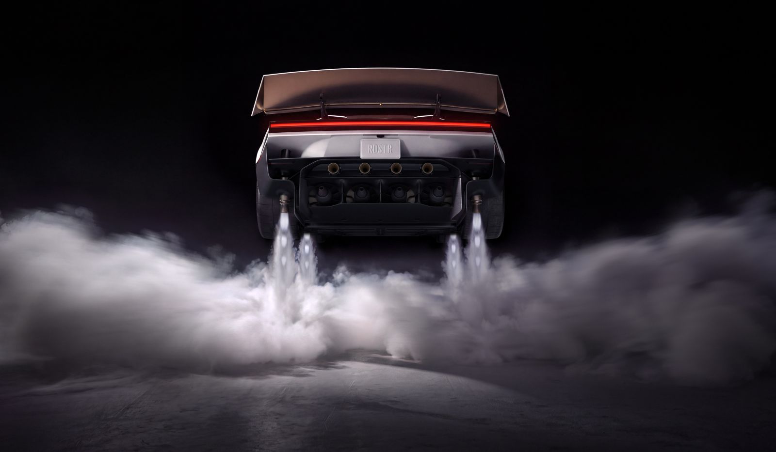 Achterkant van de Tesla Roadster met vier naar beneden gerichte stuwstralen die witte rookwolken over de grond blazen.